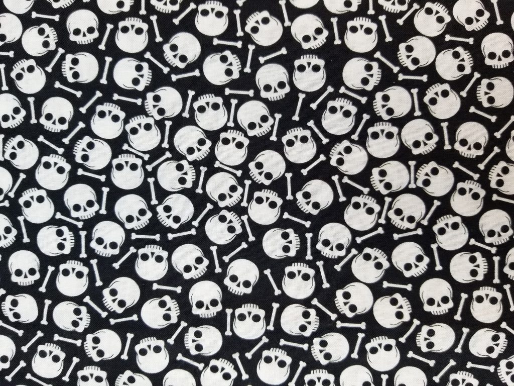 Halloween Mini Tossed Skulls and Bones Cotton Fabric By The Yard