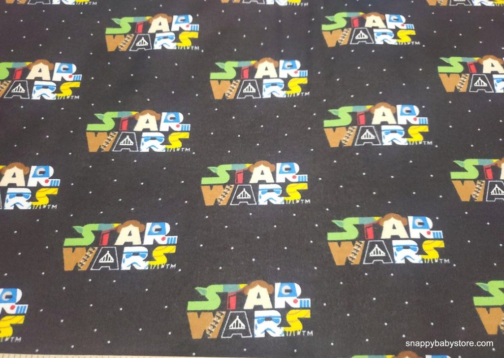 Star Wars Logo Character on Black cotton flannel fabric by the yard