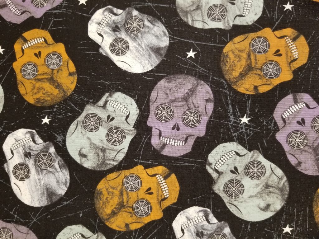Tossed Oilslick Skulls Cotton Fabric By The Yard